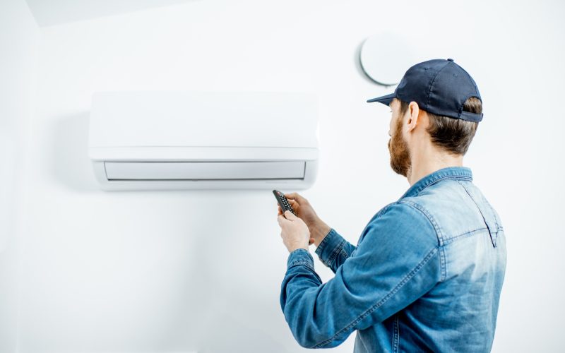Man serving the air conditioner